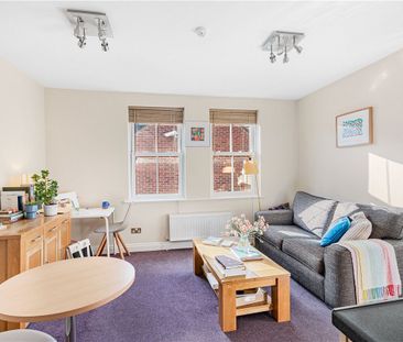 A first floor furnished flat in the heart of the bustling main stre... - Photo 1