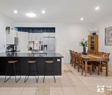 Modern 4-bedroom family home with spacious living areas - Photo 6