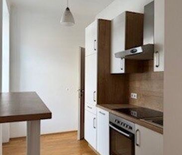 Charmante, lichtdurchflutete Wohnung in zentraler Lage: 2 Zimmer, d... - Foto 1