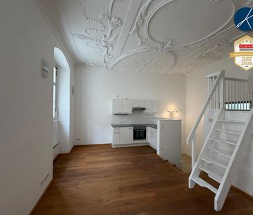 Stilvolle Galeriewohnung mit einzigartigem Altbauflair - Foto 1