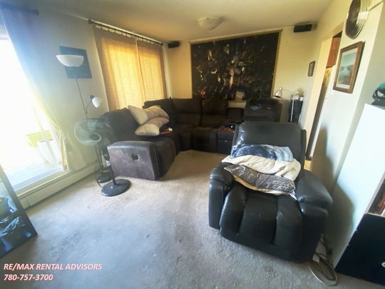 GREAT 2 BED 1.5 BATH 4TH-FLOOR APARTMENT W/AN OUTDOOR PARKING STALL IN THE COMMUNITY OF BELMEAD - Photo 1