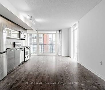 MUST SEE TWO LEVELS QUEEN WEST 1 BED PARKING INCLD - Photo 1