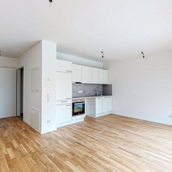 Singlewohnung mit Einbauküche und Fußbodenheizung - Foto 1