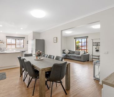 Elegant, Low-Maintenance Living in a Prime Golden Square Location - Photo 3