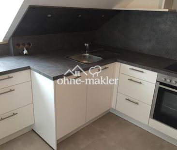 Helle 2-Zimmer DG-Wohnung mit Einbauküche und Balkon - Foto 4