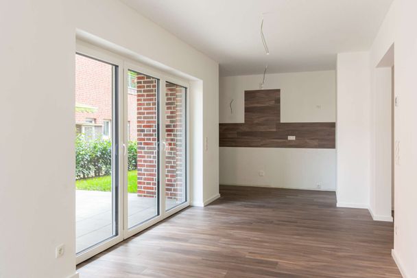 Saterland: Helle 2-Zimmer-Neubauwohnung im Erdgeschoss – Terrasse & moderne Haustechnik. Obj. 8942 - Photo 1