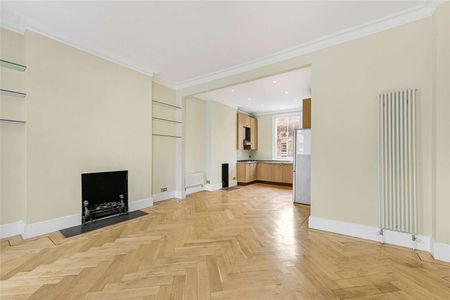 A first and second floor maisonette, benefitting from a private roof terrace, and wooden floors in the living area, conveniently located moments from the amenities of Kings Road SW3. - Photo 3