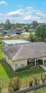 Spacious Family Home on Nearly Half an Acre - Just Minutes to CBD & Bargara Beach - Photo 3