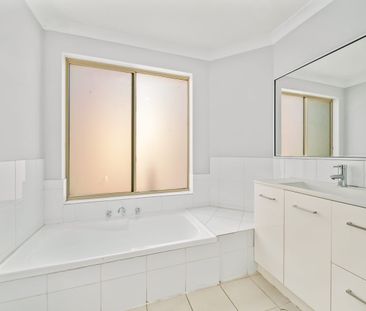 Spacious Family Home with Brand New Flooring - Photo 6