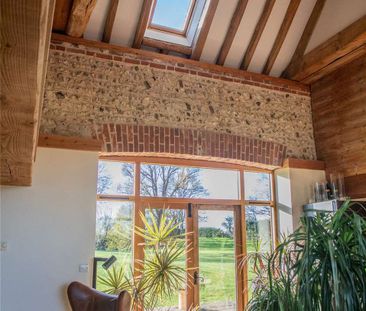 A beautifully presented 4-bedroom barn conversion with gated entran... - Photo 3