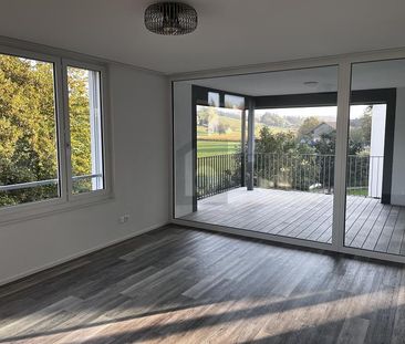 MODERNES WOHNEN DIREKT AM IDYLLISCHEN DORFBACH - Photo 1