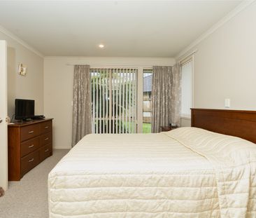 This spacious three-bedroom, two-bathroom property is nestled in th... - Photo 1