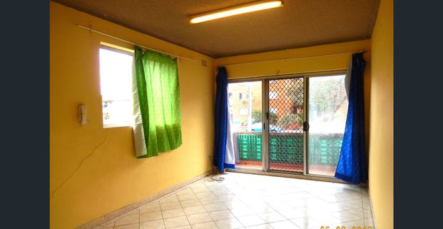 2 BEDROOM ON FIRST FLOOR UNIT, TILES FLOORING THOUGHT OUT. CLOSE TO SCHOOL. - Photo 1