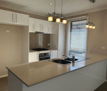 Spacious 3-Bedroom Home in a Quiet Location! - Photo 2