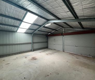 Bright Family Home with Sunroom and Outdoor Living Space - Photo 5