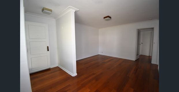 FRESHLY PAINTED 2 BEDROOM UNIT WITH HEATING/COOLING PLUS COURTYARD - Photo 1