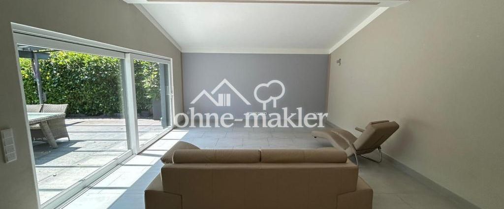 Wunderschöne moderne Erdgeschoß-Wohnung mit überdachter Terrase und eigenem Garten - Foto 1