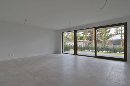 Nieuwbouwappartement met 3 slpks en autostaanplaats nabij centrum Beveren! - Photo 2