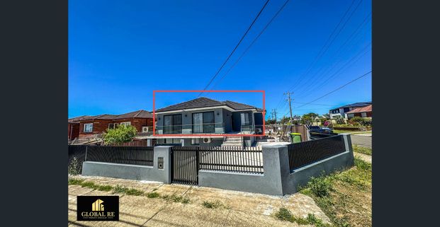 FULLY UPGRADED 4-BEDROOM UPPER-LEVEL RESIDENCE - Photo 1