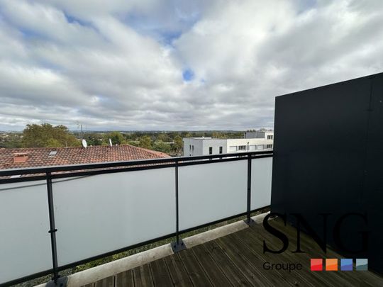 T3 AVEC BALCON + PKG EN SOUS SOL ET CAVE - Photo 1