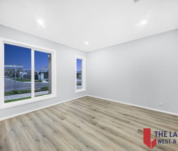 Lease | Brand-New Hampton-Style Elegance in Katalia Estate - Photo 6