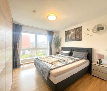 Moderne 3-Zimmer-Garten-Wohnung mit EBK und Tiefgaragenstellplatz - Photo 4