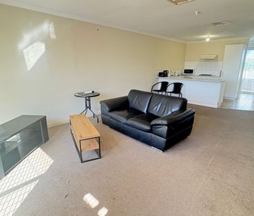 Tidy Unit in a Gated complex with sparkling pool! - Photo 4