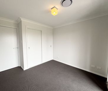 Stylish Three - Bedroom Home in Premier Gregory Hills Location - Photo 6