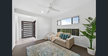 Stylish North-Facing Aura Home with Rare Side Access & Drive-Through Garage - Photo 3