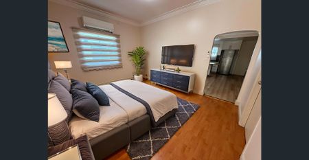 Charming Home with Modern Interiors and Sunny Outdoor Space!!! - Photo 4