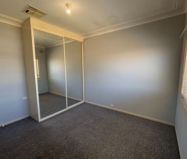 TIDY THREE BEDROOM HOME - Photo 1