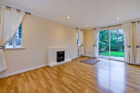 A centrally located three bedroom detached home with off street parking - Photo 2