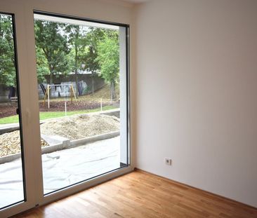 Helle 2-Zimmer Wohnung mit Klimaanlage, kleinen Garten und Garage s... - Foto 1