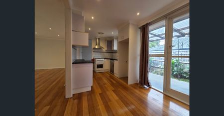 FRESHLY PAINTED, PERFECTLY POSITIONED THREE BEDROOM! - Photo 4