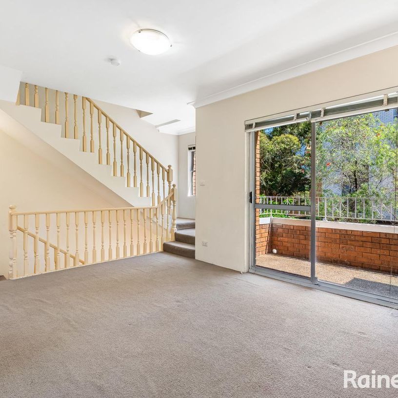 Spacious Two-Bedroom Townhouse in a Convenient Location - Photo 1