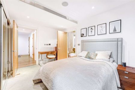 A stunning, unique three bedroom apartment with 180 degree river views in St George Wharf. - Photo 4