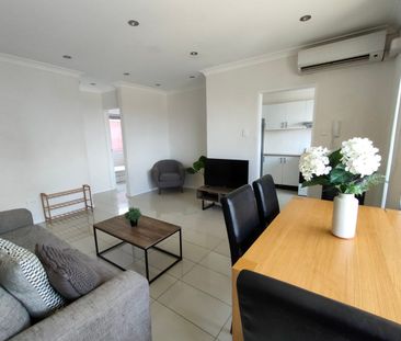 Comfort and Convenience: Fully Furnished Renovated 2-Bedroom Apartment - Photo 3