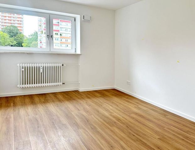 Kernsaniert: 3-Zimmer-Wohnung mit sonnigem Süd-Balkon in Taufkirchen - Foto 1