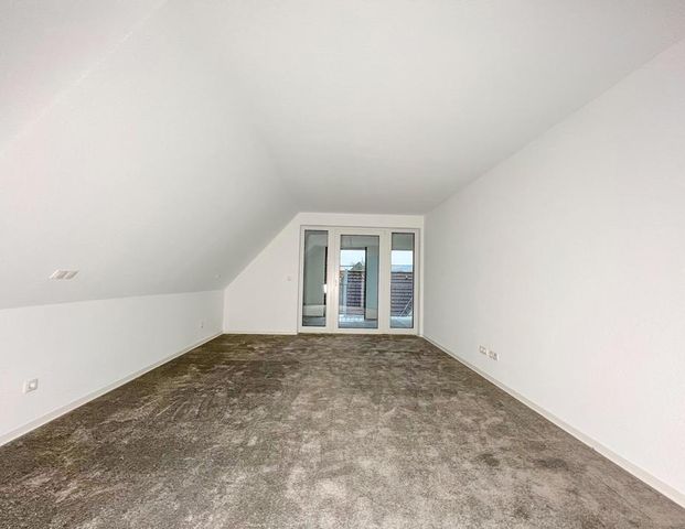 Exklusive Dachgeschosswohnung zur Warmmiete - Foto 1