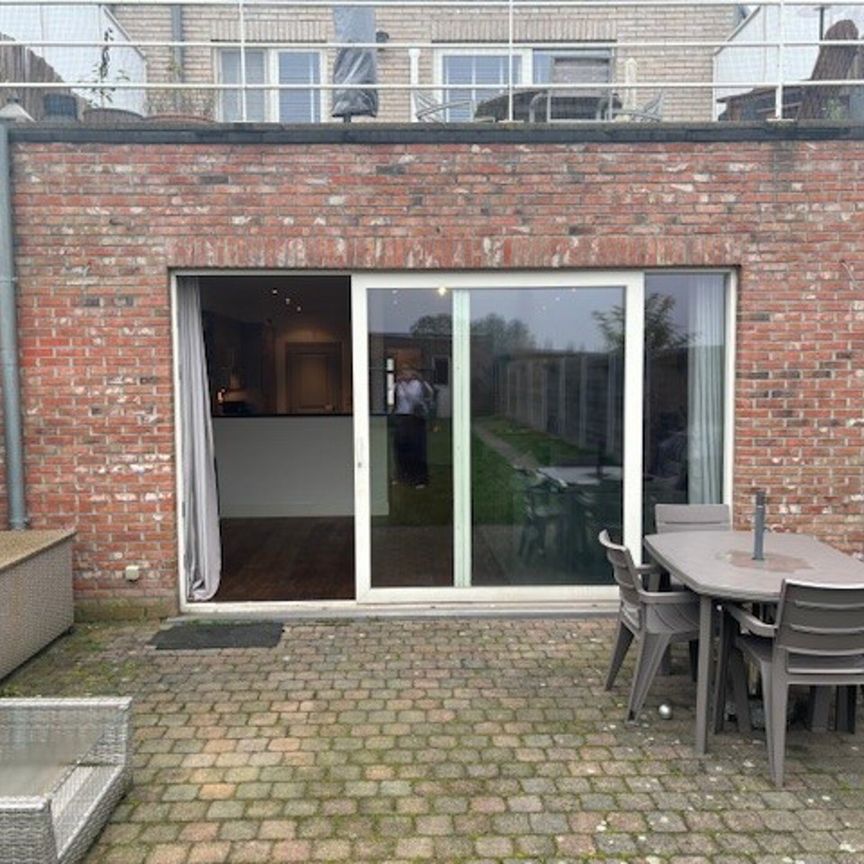 Gelijkvloers appartement met tuin en garage! - Photo 1