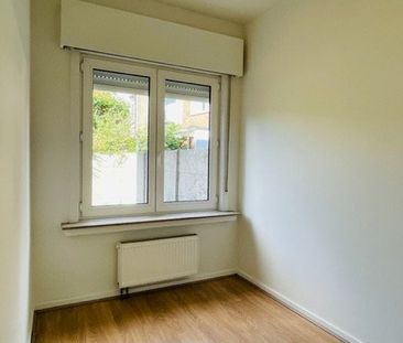 Gelijkvloers appartement met 2 slaapkamers en stadstuintje. - Foto 4