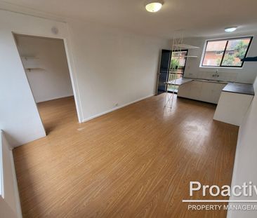 Stylish & Low-Maintenance Apartment Living in a Convenient Location - Photo 4