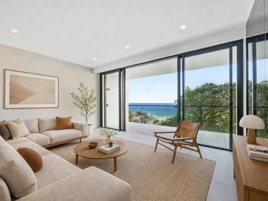 Stylish One-Bedroom Designer Beachside Apartment with Spectacular Views and Secure Parking - Photo 1