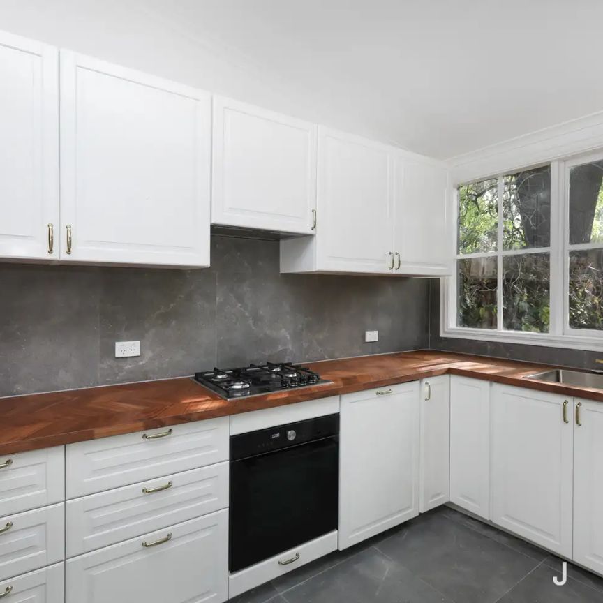“LOVELY TWO BEDROOM WITH UPDATED BATHROOM” - Photo 1