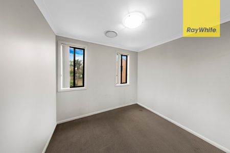 Spacious Tri-Level Townhouse - Light-Filled and Conveniently Located - Photo 3