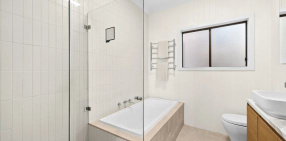 Elevated Coastal Living in a Central Location - Photo 2