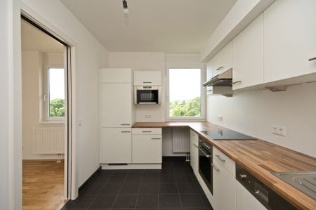 Helle 3-Zimmer-Dachgeschosswohnung mit sonniger Terrasse im 19. Bezirk - Foto 2