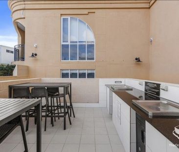 Light-Filled Luxury in Emerald Lakes Most Sought-After Building - Photo 4