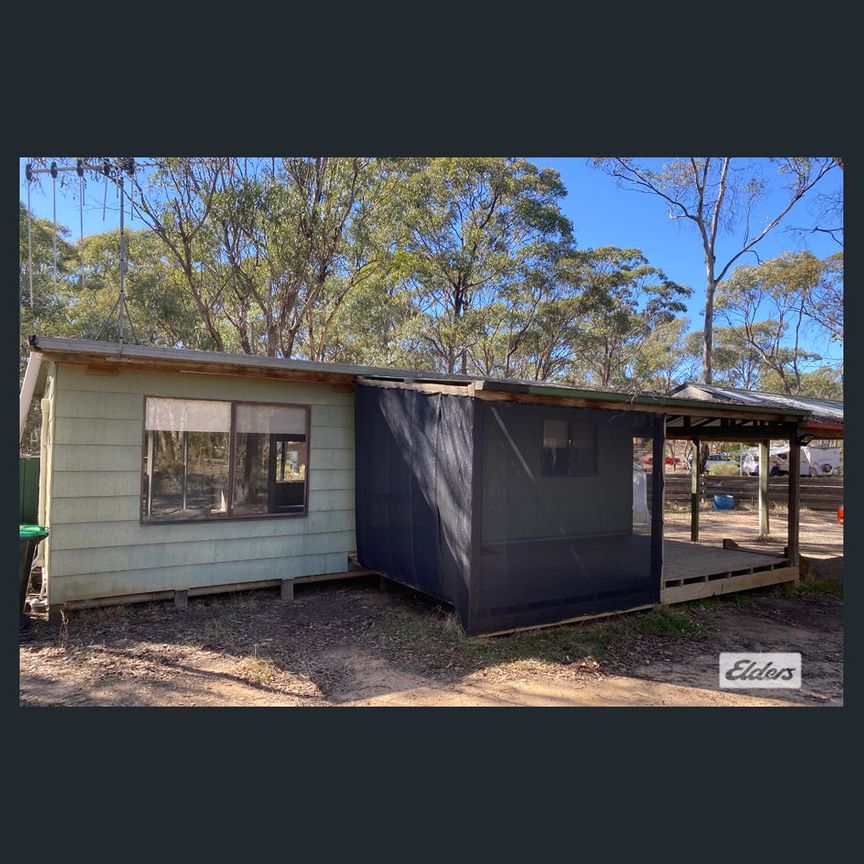 Affordable Comfort in a Peaceful Setting - Photo 1