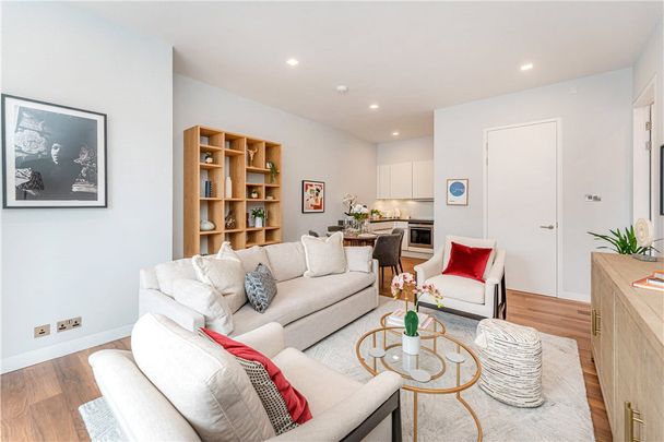 A two bedroom penthouse with air conditioning throughout of approximately 997 square feet. - Photo 1